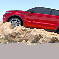 Red Range Rover SUV Standing On Rugged Rock Pile Under Clear Blue Sky 3d model