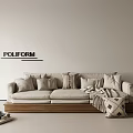 Poliform Beige Sectional Sofa With Plush Pillows Wooden Base And Side Table Decor