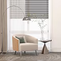 Beige Armchair With Green Cushion Floor Lamp Window Blinds And Side Table With Vase Plant