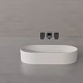 White Oval Washbasin With Black Faucet On Gray Countertop Modern Design