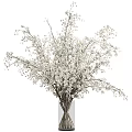 Elegant Floral Decoration With White Baby's Breath Bouquet In Clear Vase