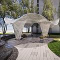 Modern Openwork Pergola In Outdoor Garden With Green Lawn And Trees