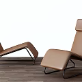 Modern Tan Leather Chaise Lounge With Black Metal Frame And Comfortable Design