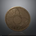 Ornate Round Bronze Shield with Intricate Patterns and Central Radiant Design