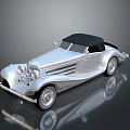 Silver Classic Convertible Car With Black Soft Top And Vintage Design