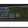 Industrial Factory Building Complex With Blue Roof Structures Parked Trucks And Solar Panels