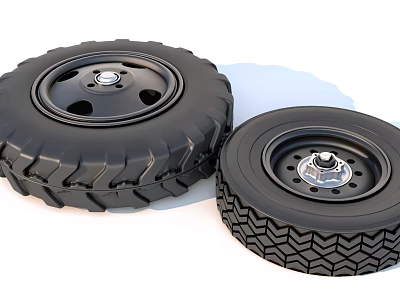 Two Black Vehicle Tires With Metal Wheel Rims And Tread Patterns 3d model