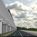 Elevated Railway Bridge With Train Over Road And Green Trees Under Blue Sky White Clouds