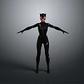 Catwoman In Black Bodysuit With Cat Ear Mask Arms Outstretched Against Gray Background