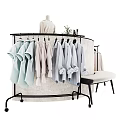 Stylish Clothing Display With Hanging Garments Wooden Stands And Accessories
