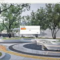 Modern Park Landscape With Lush Trees Circular Paths Green Lawn And Curved Benches