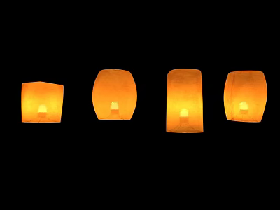 Bright Yellow Sky Lanterns Illuminated Against Black Background 3d model
