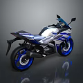 Sporty White And Blue Motorcycle With Blue Alloy Wheels And Sleek Design