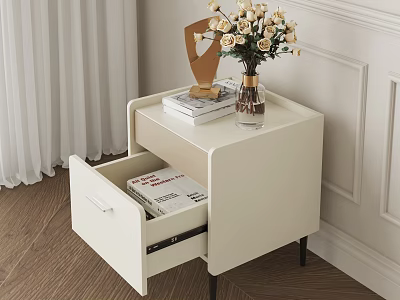 White Bedside Table with Open Drawer Containing Books and Vase of Flowers on Top 3d model