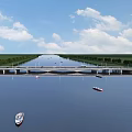 Scenic Bridge Over River With Boats Green Banks And Blue Sky