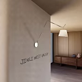 Modern Wall Lamp With Sleek Metal Arm And White Lampshade In Interior With Wooden Cabinet
