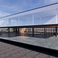 Modern Sales Office Building With Glass Curtain Wall Water Feature And Open Outdoor Space