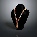 Stylish Beaded Necklace With Orange And White Beads On Black Mannequin