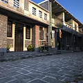 Traditional Chinese Garden Landscape With Stone Path Courtyard And Ancient Buildings