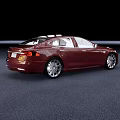 Red Modern Luxury Car With Sleek Exterior Design And Shiny Alloy Wheels