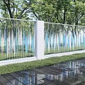 Modern Building Exterior Wall Design With White Columns Metal Railings Green Trees And Lush Grass