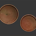 Hand Carved Brown Ceramic Bowls With Textured Surface And Smooth Edges