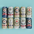 Assorted Beer Cans In Various Colors Arranged On Light Blue Background