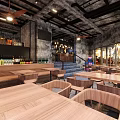 Industrial Style Bar Interior Design With Wooden Tables Chairs Wine Racks And Lighting