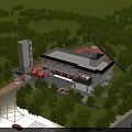 Fire Station Building With Red Fire Trucks Surrounded by Green Trees and Parking Area