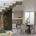 Modern Dining Area With Round Black Table Grey Chairs And Illuminated Display Shelves