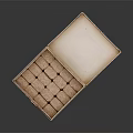 Wooden Box Containing Neatly Arranged Small Square Brown Dessert Pastries
