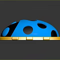 Blue Ladybug Shaped Clothing Accessory With Black Spots And Golden Border