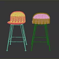 Woven Black and Orange Bar Stools With Black Metal Legs In Dark Background