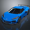 Blue Corvette Sports Car With Rear Spoiler And Black Performance Wheels