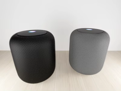 Two Wireless Smart Speakers with Black Gray Mesh Design and Circular Top Indicators on Wooden Floor 3d model