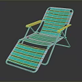 Striped Teal Lounge Chair With Yellow Armrests And Metal Frame For Outdoor Relaxation
