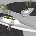 Unique Modern Public Chair Design With Integrated Green Plants And Seated Person In Outdoor Square