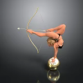Graceful Woman Doing Handstand On Golden Ball While Holding Bow