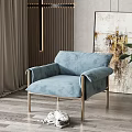 Modern Light Blue Single Sofa with Metal Frame and Cat Potted Plant on Wooden Floor