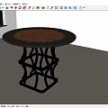 Round Dining Table with Black Border and Brown Patterned Top and Black Geometric Cut-out Legs