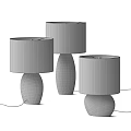 Three Modern Table Lamps with Different Colored Wooden Bases and Cream Linen Shades