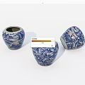 Three Blue and White Ceramic Vessels with Traditional Landscape Patterns Displayed 3d model
