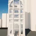 Classical Style Building With Arched Windows And White Facade In Cloudy Urban Skyline