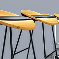 Stylish Bar Stools With Yellow Seats Black Cushions And Metal Frames