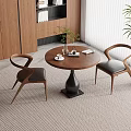Stylish Dining Area Interior With Round Wooden Table Stylish Chairs Black Cushions Vase And Books