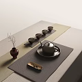 Minimalist Tea Set with Teapot Teacups Tray Arranged on Elegant Mat and Decorative Vase