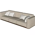 Modern Three Seater Sofa With Beige Upholstery And Plush Decorative Cushions