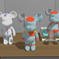 Decorative Ornament Set With Three Cartoon Bear Figurines On Wooden Table And Stacked Books