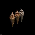 Three Delicious Brown Ice Cream Cones With Different Waffle Cone Textures