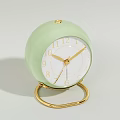 Round Light Green Alarm Clock With Gold Accents And Stand